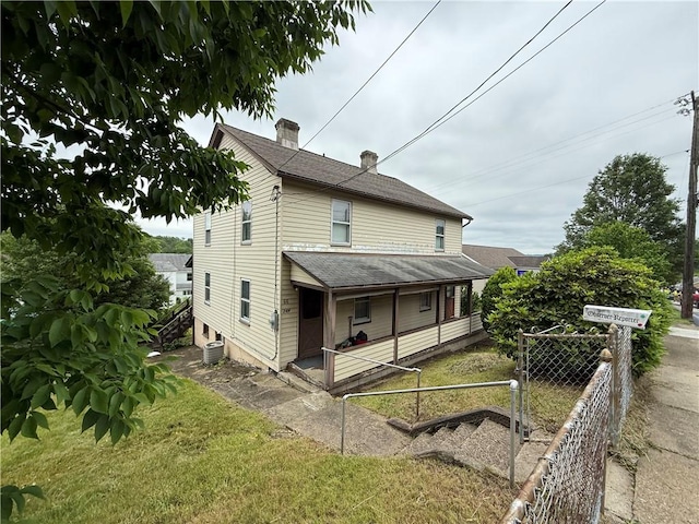 66 Beech St, Cecil, PA 15350 - view of front facade with a porch, a chimney, and roof with shingles