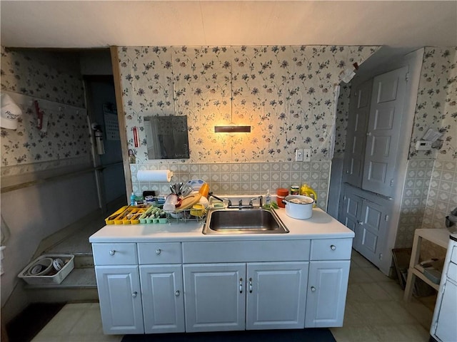 66 Beech St, Cecil, PA 15350 - kitchen with wallpapered walls and light countertops