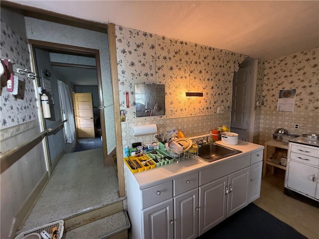 66 Beech St, Cecil, PA 15350 - kitchen with wallpapered walls and light countertops