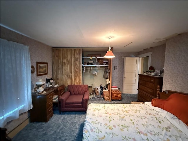66 Beech St, Cecil, PA 15350 - bedroom with dark colored carpet, wallpapered walls, and a closet