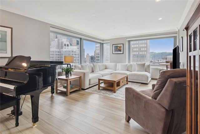 320 Fort Duquesne Blvd Unit 23L, Downtown Pgh, PA 15222 - living area featuring light wood-style flooring, crown molding, and recessed lighting