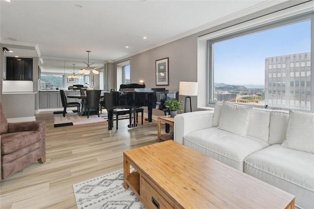 320 Fort Duquesne Blvd Unit 23L, Downtown Pgh, PA 15222 - living room featuring crown molding, light wood finished floors, and recessed lighting
