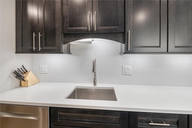 320 Fort Duquesne Blvd Unit 23L, Downtown Pgh, PA 15222 - kitchen featuring dishwasher, light countertops, and dark brown cabinetry
