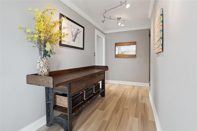 320 Fort Duquesne Blvd Unit 23L, Downtown Pgh, PA 15222 - hall with light wood-type flooring, crown molding, and rail lighting