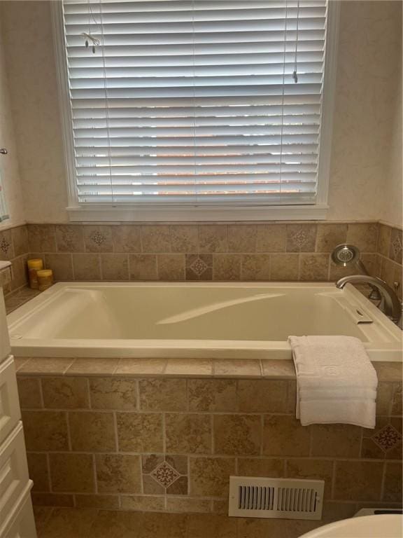 4619 5th Ave, Beaver Falls, PA 15010 - bathroom featuring a garden tub and healthy amount of natural light