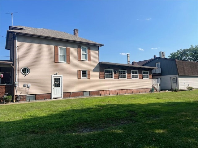 4619 5th Ave, Beaver Falls, PA 15010 - rear view of property featuring a lawn and a chimney