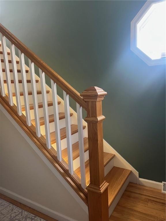 4619 5th Ave, Beaver Falls, PA 15010 - stairs featuring baseboards and wood finished floors