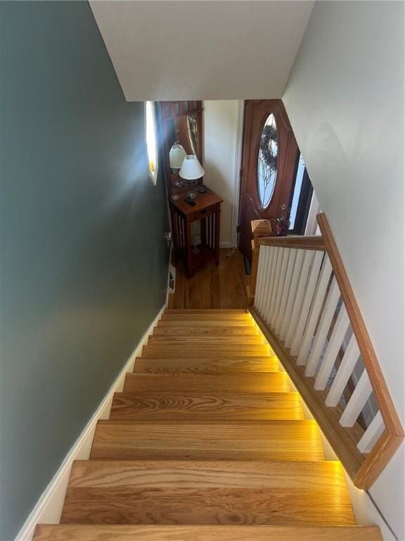 4619 5th Ave, Beaver Falls, PA 15010 - staircase featuring wood finished floors and baseboards
