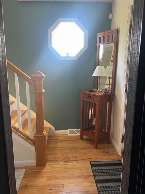 4619 5th Ave, Beaver Falls, PA 15010 - foyer featuring stairs and wood finished floors