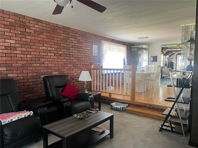 4619 5th Ave, Beaver Falls, PA 15010 - living area featuring brick wall and ceiling fan