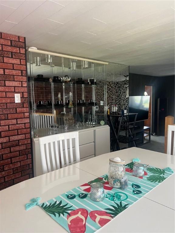 4619 5th Ave, Beaver Falls, PA 15010 - dining space with brick wall