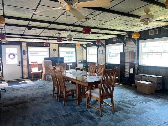 4619 5th Ave, Beaver Falls, PA 15010 - dining space featuring a ceiling fan, carpet flooring, and plenty of natural light