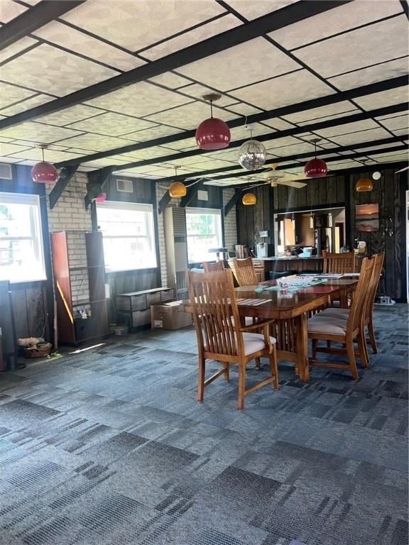 4619 5th Ave, Beaver Falls, PA 15010 - dining area featuring carpet floors and healthy amount of natural light
