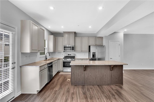 222 Amon St, Cranberry Twp, PA 16066 - kitchen with stainless steel appliances, gray cabinets, a kitchen island, dark wood-type flooring, and recessed lighting