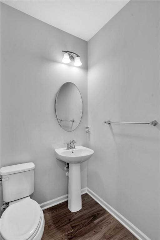 222 Amon St, Cranberry Twp, PA 16066 - bathroom featuring wood finished floors and toilet