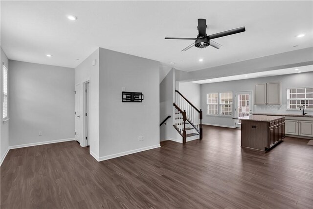 222 Amon St, Cranberry Twp, PA 16066 - unfurnished living room featuring dark wood finished floors, a ceiling fan, stairs, and recessed lighting