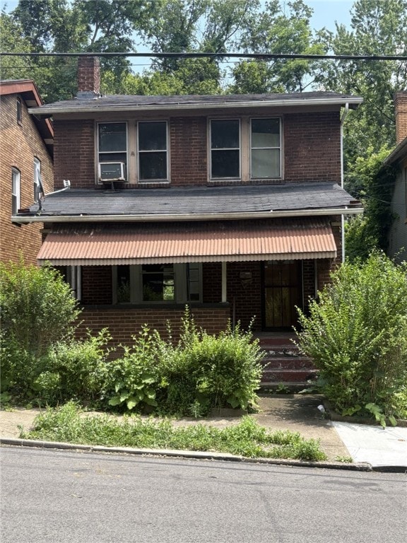 1308 Franklin Ave, Wilkinsburg, PA 15221 - view of front of property with a porch and brick siding