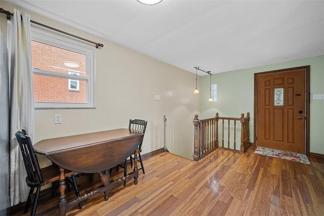 723 Rose Ln, Baldwin Twp, PA 15234 - dining area with wood finished floors and baseboards