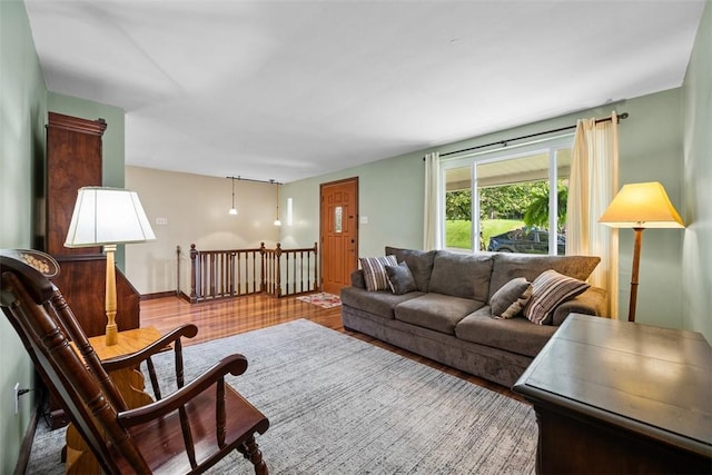 723 Rose Ln, Baldwin Twp, PA 15234 - living room with wood finished floors and baseboards