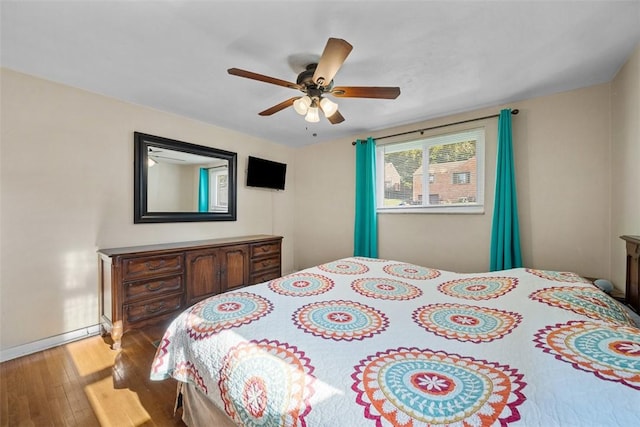 723 Rose Ln, Baldwin Twp, PA 15234 - bedroom with wood finished floors and ceiling fan