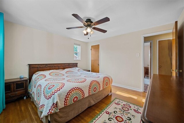 723 Rose Ln, Baldwin Twp, PA 15234 - bedroom featuring wood finished floors and a ceiling fan
