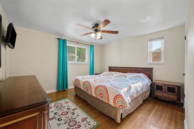 723 Rose Ln, Baldwin Twp, PA 15234 - bedroom with wood finished floors and ceiling fan