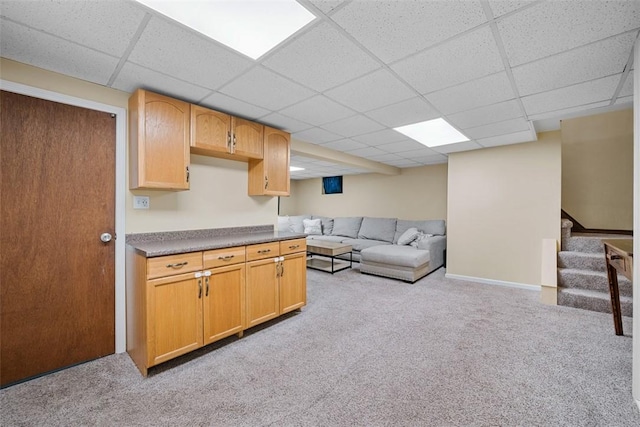 723 Rose Ln, Baldwin Twp, PA 15234 - living room featuring light colored carpet, a paneled ceiling, and stairway