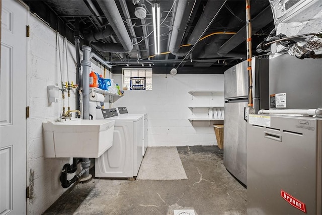 723 Rose Ln, Baldwin Twp, PA 15234 - below grade area featuring washing machine and dryer and heating unit