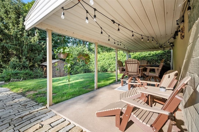 723 Rose Ln, Baldwin Twp, PA 15234 - view of patio with a storage shed