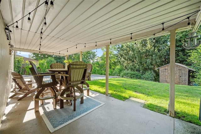 723 Rose Ln, Baldwin Twp, PA 15234 - view of patio featuring outdoor dining area and a shed