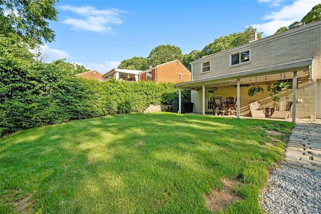 723 Rose Ln, Baldwin Twp, PA 15234 - view of green lawn with a patio area
