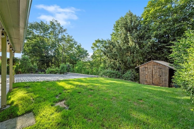 723 Rose Ln, Baldwin Twp, PA 15234 - view of grassy yard featuring a shed