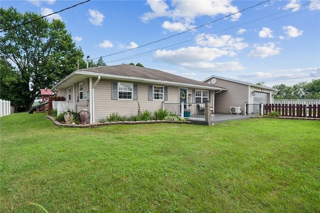 213 Mcdonald Dr, North Huntingdon, PA 15642 - back of property with an attached garage and a patio