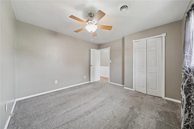 213 Mcdonald Dr, North Huntingdon, PA 15642 - unfurnished bedroom featuring carpet floors, a closet, and a ceiling fan