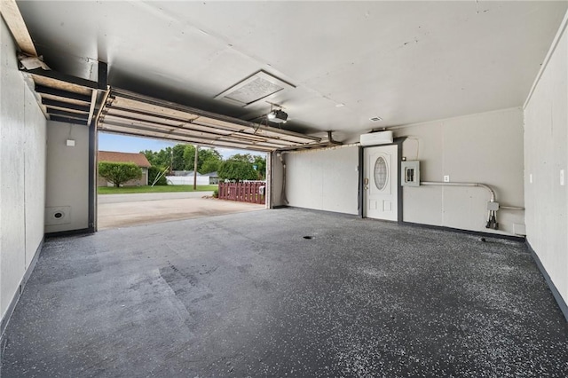 213 Mcdonald Dr, North Huntingdon, PA 15642 - garage with a garage door opener and electric panel