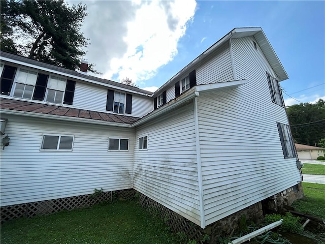 653 Upr Middletown Rd, Menallen Twp, PA 15480 - view of property exterior featuring a chimney