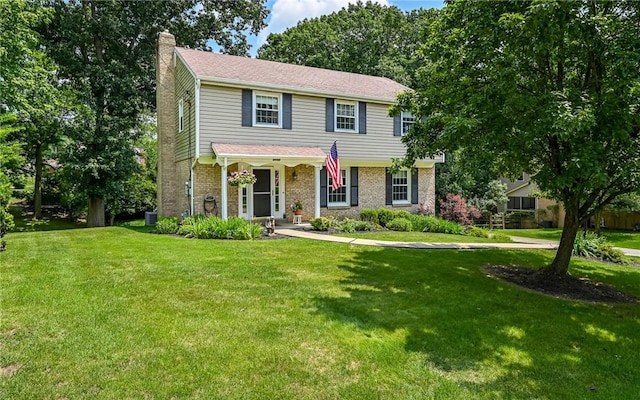 2712 Champlain, Shaler, PA 15101 - colonial house featuring a chimney, a front lawn, and brick siding