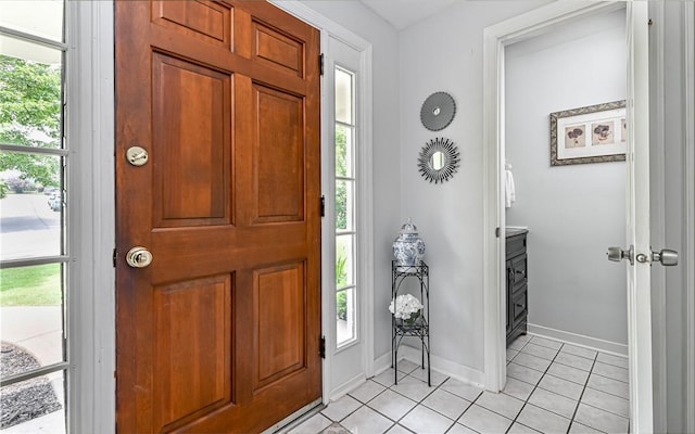 2712 Champlain, Shaler, PA 15101 - foyer entrance with light tile patterned floors and healthy amount of natural light