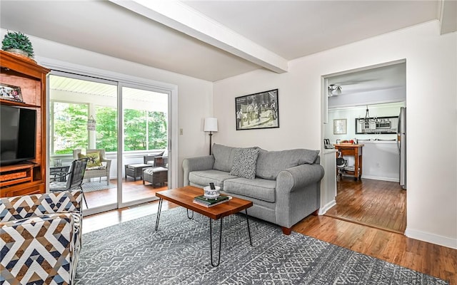 2712 Champlain, Shaler, PA 15101 - living room featuring wood finished floors and beam ceiling