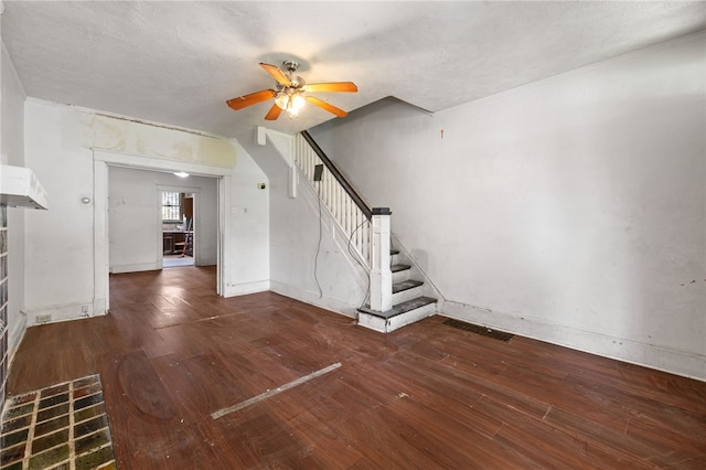 6933 Mcpherson Blvd, Point Breeze, PA 15208 - unfurnished living room with wood-type flooring, a ceiling fan, and stairway