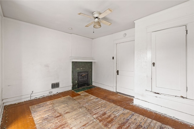 6933 Mcpherson Blvd, Point Breeze, PA 15208 - unfurnished living room featuring wood-type flooring, ceiling fan, and a fireplace with flush hearth