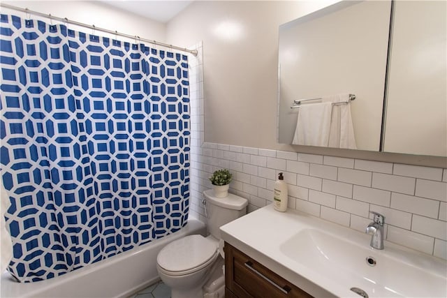 5553 Pocusset St, Squirrel Hill, PA 15217 - bathroom with shower / tub combo with curtain, vanity, and tile walls