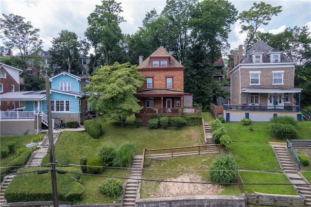 109 Watson Blvd, Perry Hilltop, PA 15214 - view of front of house featuring stairs and a front lawn
