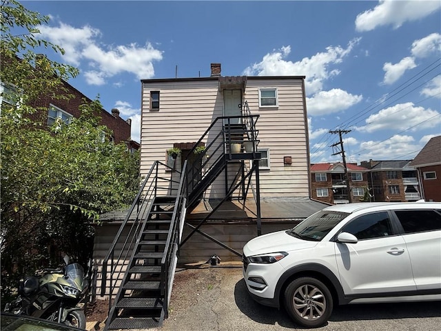 1201 Illinois Ave, Dormont, PA 15216 - view of front of property with stairs and a chimney