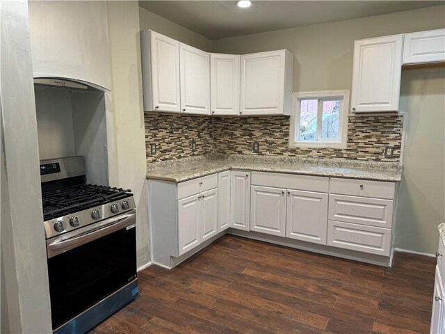 522 Cubbage St, Carnegie, PA 15106 - kitchen with stainless steel range with gas stovetop, custom range hood, dark wood finished floors, tasteful backsplash, and recessed lighting
