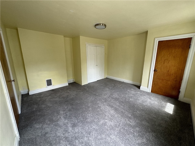 522 Cubbage St, Carnegie, PA 15106 - unfurnished bedroom featuring dark colored carpet and a closet
