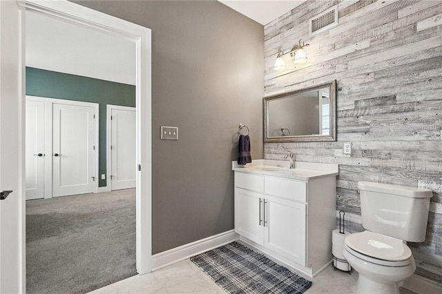 1416 Commons Ln, South Fayette, PA 15017 - bathroom with wooden walls, vanity, and an accent wall