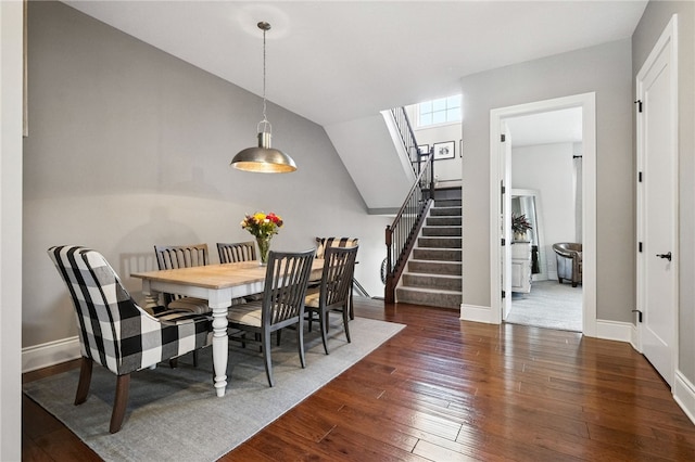 1416 Commons Ln, South Fayette, PA 15017 - dining area featuring wood-type flooring, a skylight, stairs, and lofted ceiling