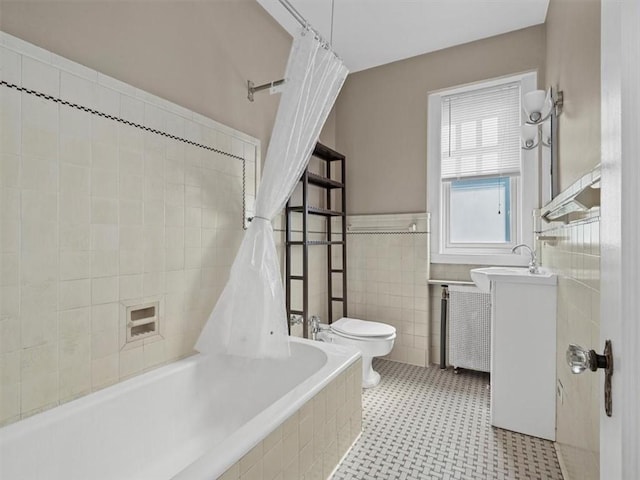 166 N Dithridge St Unit 3E, Oakland, PA 15213 - full bath featuring tile walls, vanity, tiled shower / bath, wainscoting, and tile patterned floors