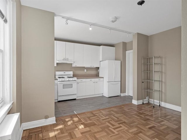 166 N Dithridge St Unit 3E, Oakland, PA 15213 - kitchen with white appliances, under cabinet range hood, white cabinets, rail lighting, and light countertops